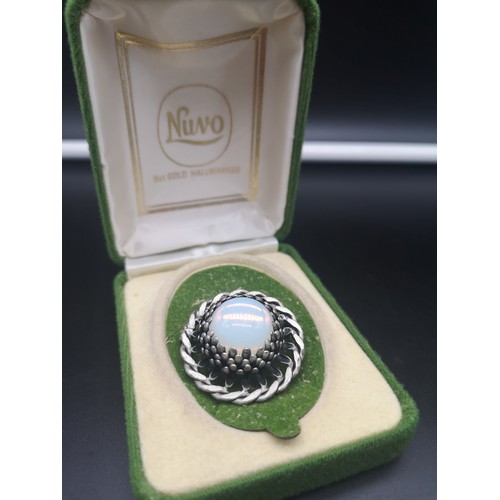 170 - Ornate brooch with moon stone effect.