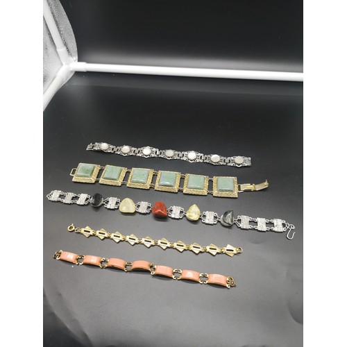172 - 5 ornate bracelets.