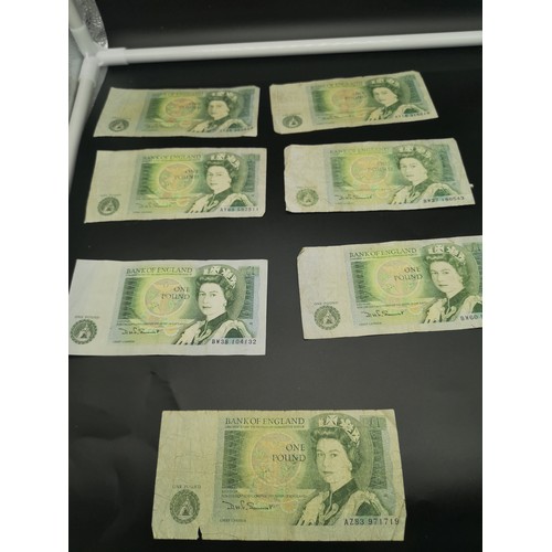 244 - 7 bank of England £1 pounds.