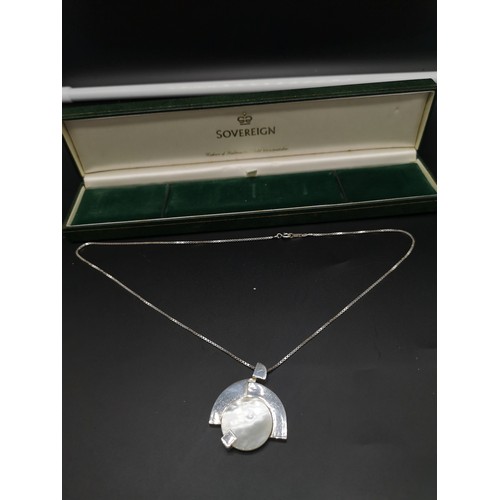 81a - Silver necklace set with unusual pendant.