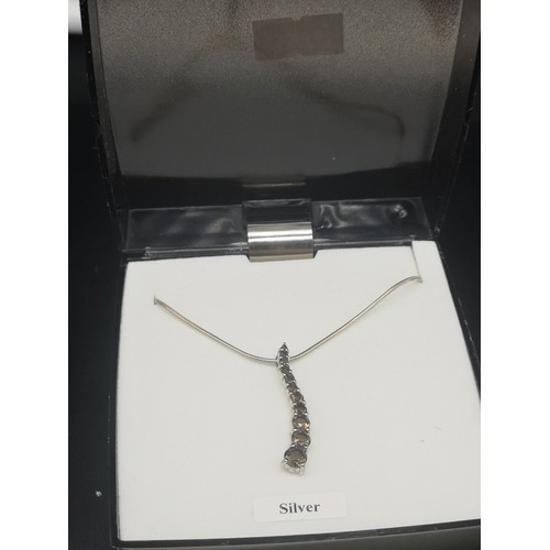 194 - Silver necklace set with smokey quartz design pendant.