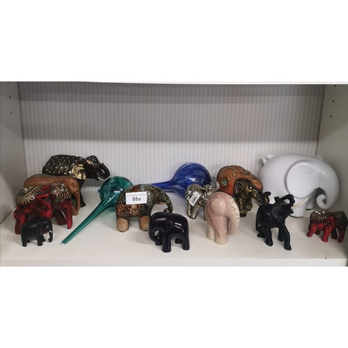 88a - Shelf of elephants etc.