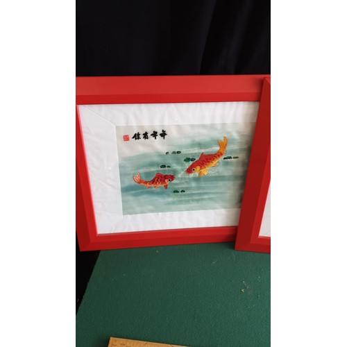 74 - 2 Oriental silks, signed in red framed.