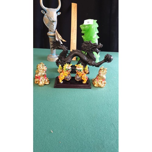 70 - Lot of collectable includes Oriental dogs, dragon figure, green coloured lion etc.