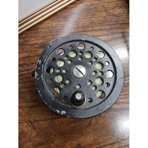 77 - Large super condex fishing reel.