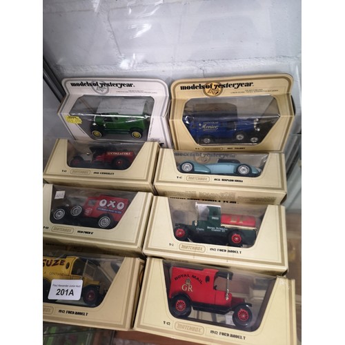 201a - Shelf of matchbox yesteryear models.