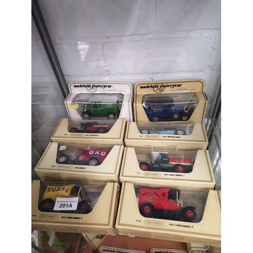 201a - Shelf of matchbox yesteryear models.