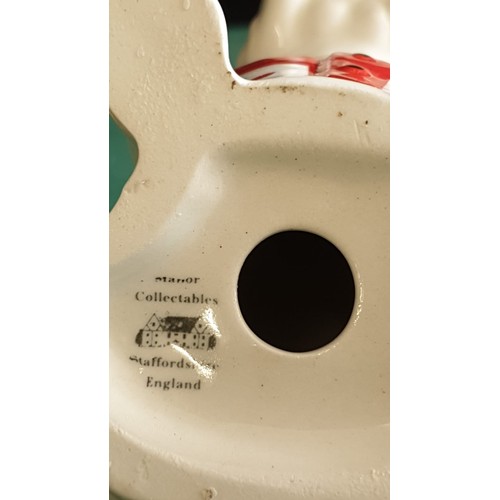 24 - Staffordshire bull dog Figure with Union Jack flag.