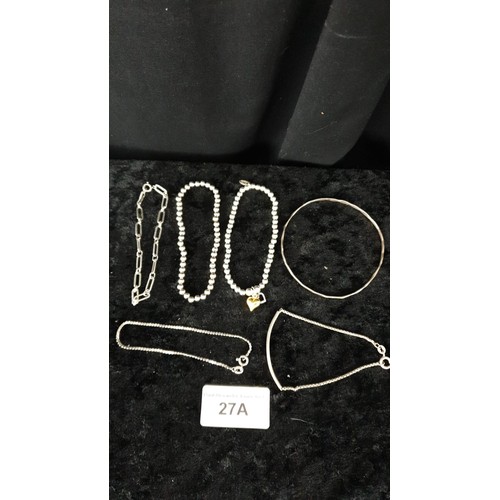 27a - 5 Silver Bracelets and silver bangle .