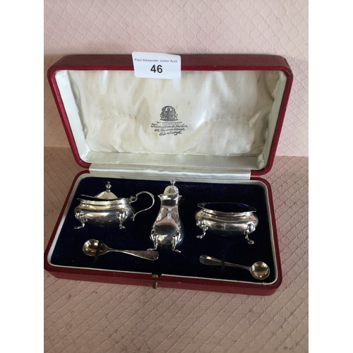 46 - Silver Hall marked Edinburgh cruet set makers Hamilton and inches in original box.