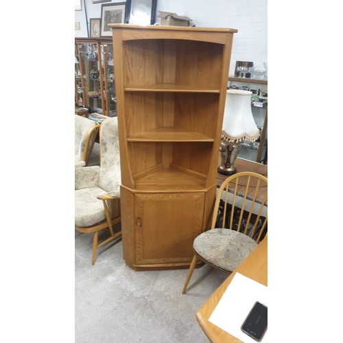 51 - Ercol Blonde Wood corner cabinet.