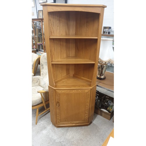 51 - Ercol Blonde Wood corner cabinet.