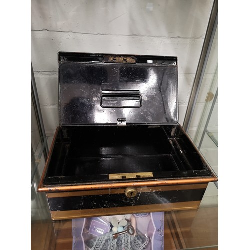 234 - Early cash box with key.