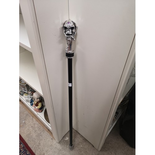 81 - Ornate skull topped head walking stick.