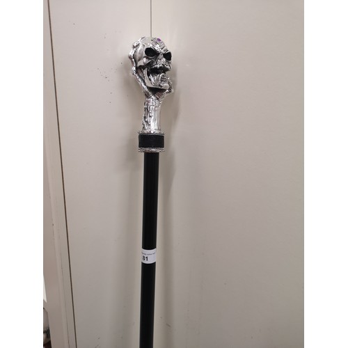 81 - Ornate skull topped head walking stick.