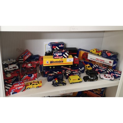 74 - Shelf of boxed corgi truck and cars etc.