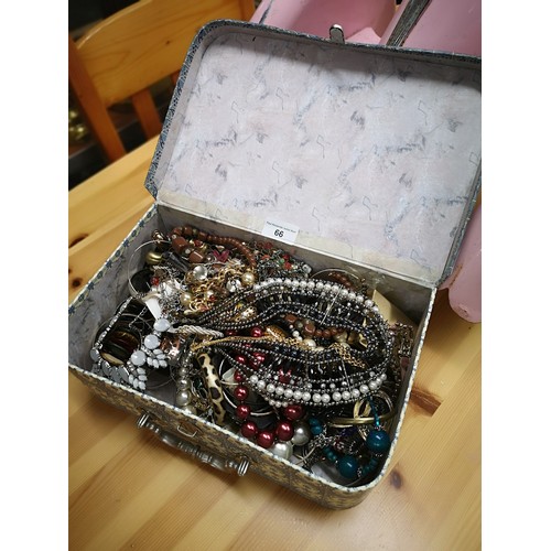 66 - Box of costume Jewellery.