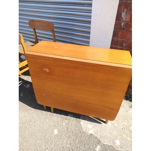 316 - Teak drop table with 6 chairs. no makers .