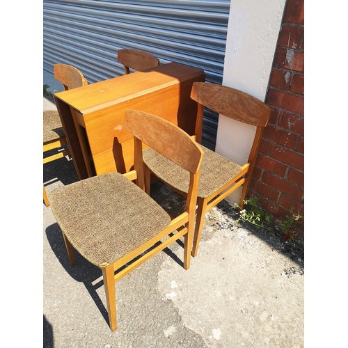 316 - Teak drop table with 6 chairs. no makers .