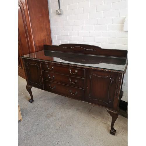 317 - Large Ornate side board with glass preserve top. 5 ft in length.