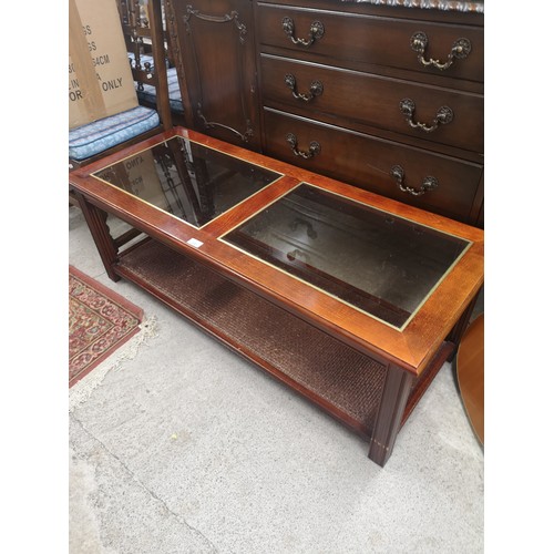 330 - 2 Tier coffee table with glass inserts .