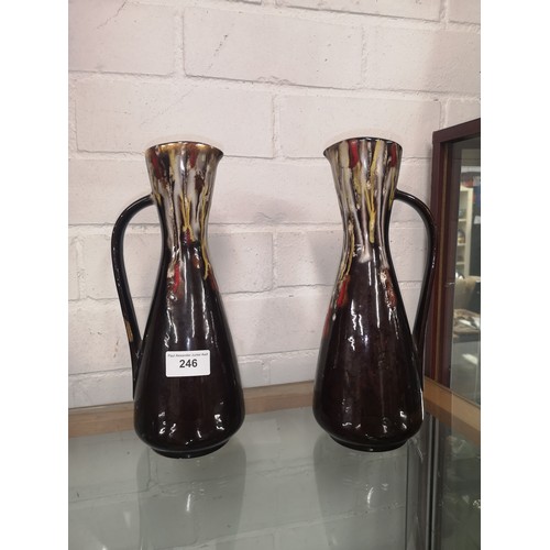 246 - Pair of West Germany drip glazed retro jugs.