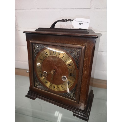 91 - Smiths Enfield mantle clock with pendulum and key .