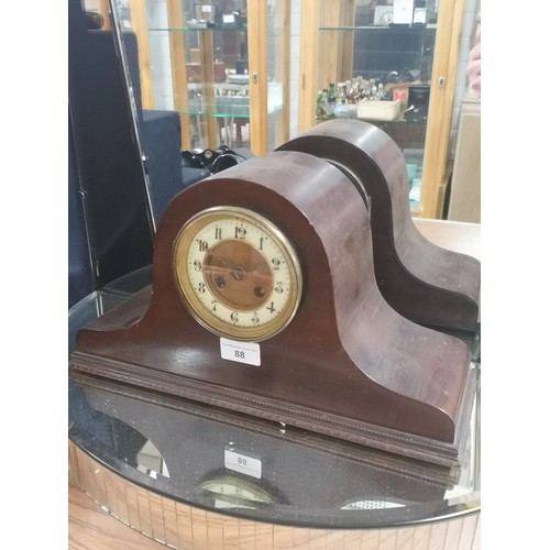 88 - 1900s enamel faced clock with pendulum .