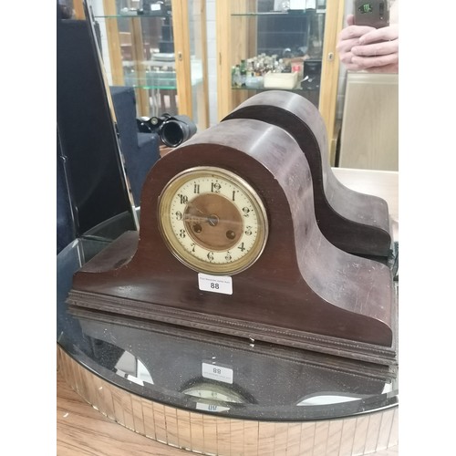 88 - 1900s enamel faced clock with pendulum .