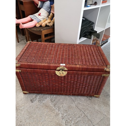 298 - Quality oriental style linen trunk containing linen.