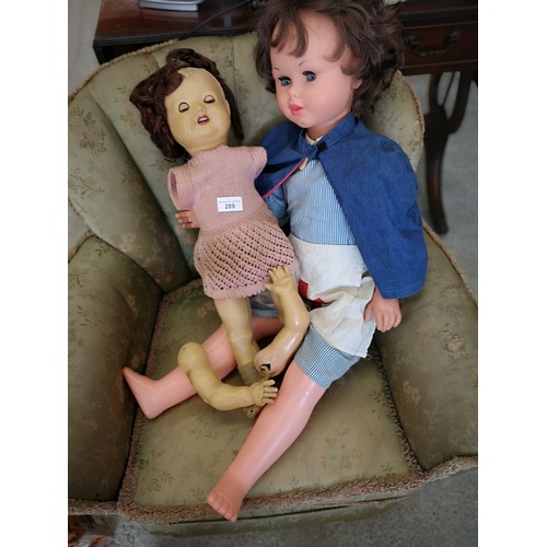 289 - Large vintage doll together with early doll with eyes that open and close .