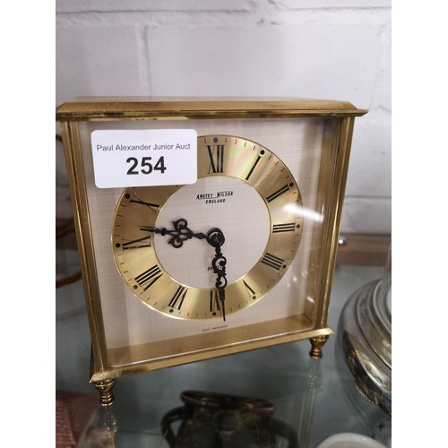 254 - Anstey wilson england brass clock together with dome clock .