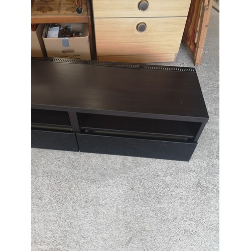 104 - Quality low tv unit with drawers.