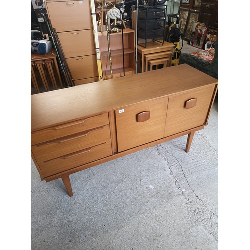 402 - Retro 1970s teak pedistal sideboard .