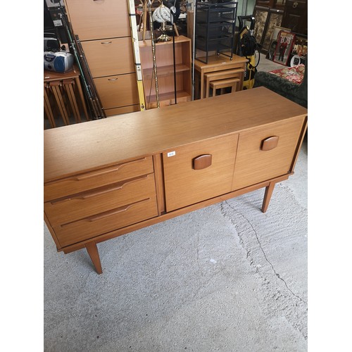 402 - Retro 1970s teak pedistal sideboard .