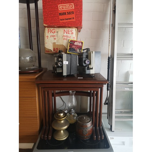 400 - Lot of collectables includes 2 projectors oil lamps and biscuit barrel.