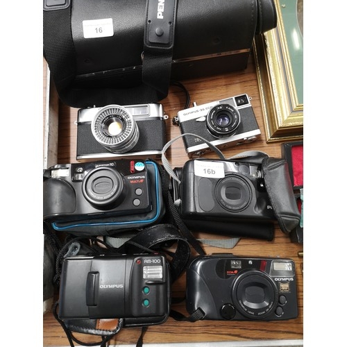 16b - Lot of camera s .