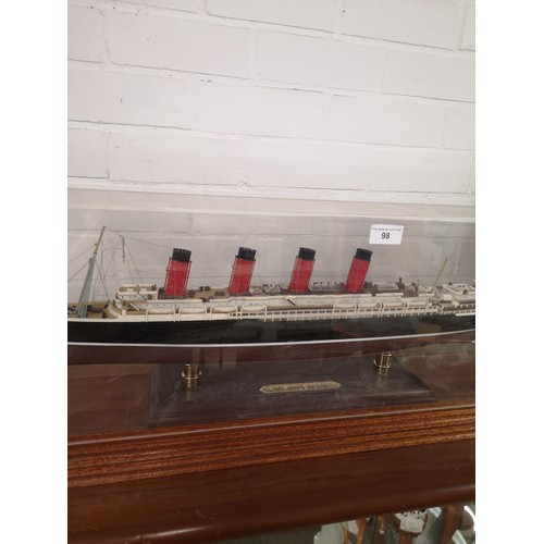 98 - Large ship model set in heavy perspex casing .