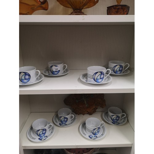 166 - 2 Shelfs of rennie makcintosh design  tea wares togther with clock .