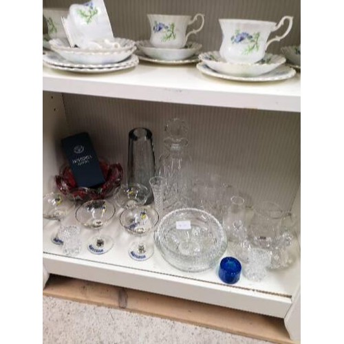 434 - Shelf of crystal includes baby sham glasses .