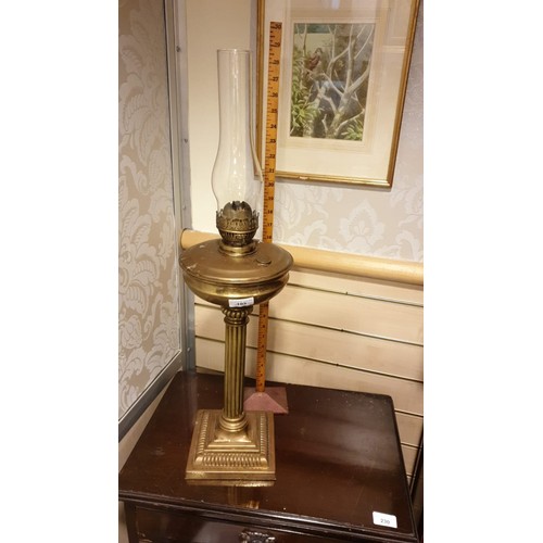 103 - Huge Solid Brass Corinthian column  oil lamp on heavy brass squared base stands 28 inches in height ... 