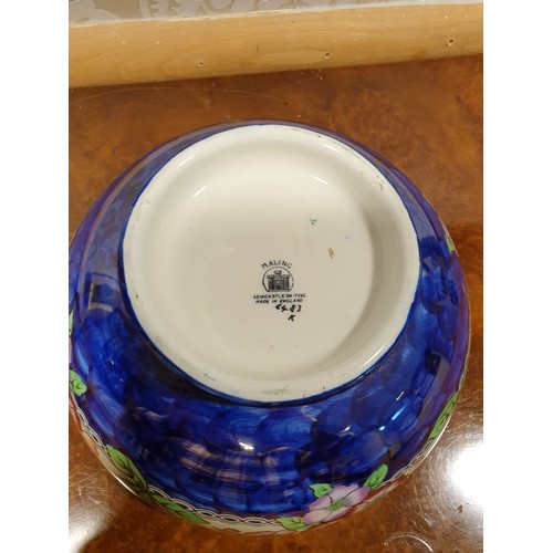 141 - Maling blue thumb print bowl.