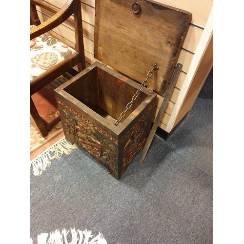 159 - Beautiful example of a carved wooden trunk with shield foliage and carved designs .