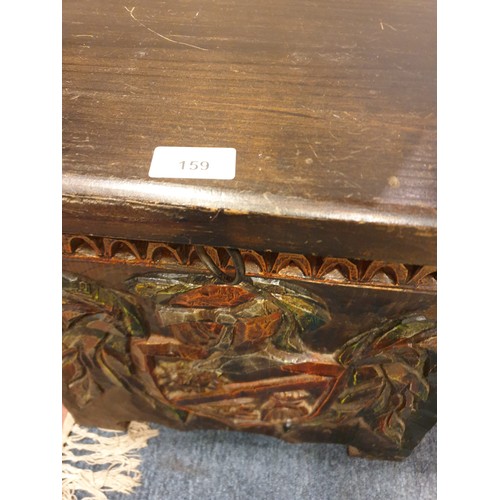 159 - Beautiful example of a carved wooden trunk with shield foliage and carved designs .