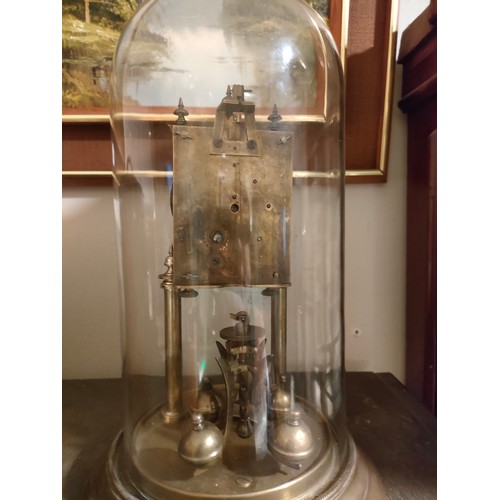 226 - 1900s Brass dome clock with glass dome .