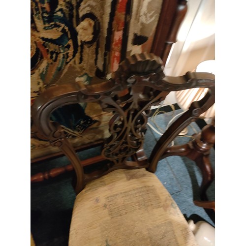 215 - Pair of Victorian Parlour chairs with ceramic caster feet  .