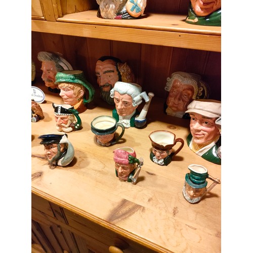 214 - Large Collection of 61 Royal Doulton toby jugs .