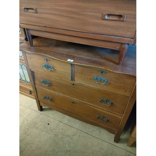 240 - 19th century bow style front 2 over 2 oak chest .