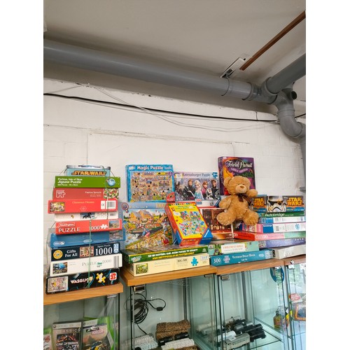 318 - Large lot of puzzles etc .