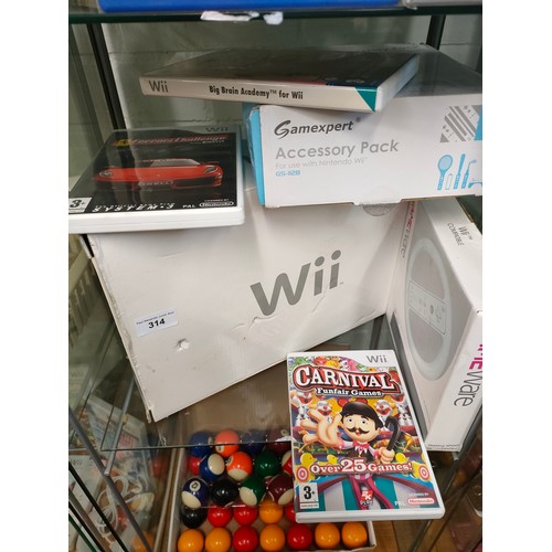 314 - Boxed Nintendo wii with games etc .